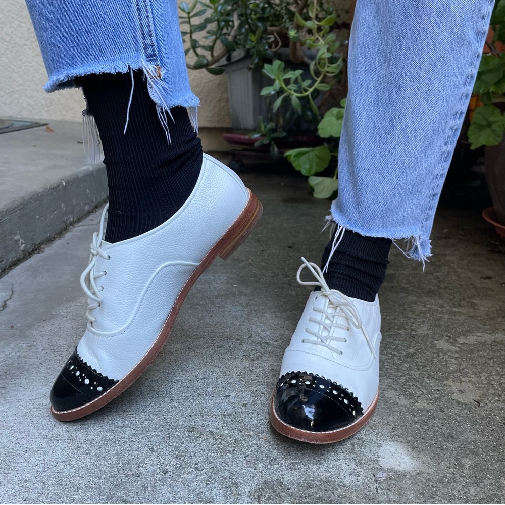 White and black Kate Spade leather loafers